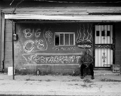 Big-C-restaurant-Shelby Shelby MS: James Jenkins sitting in the shade as if something was going to happen. Big C's Restaurant did not look like it had been open for years.
