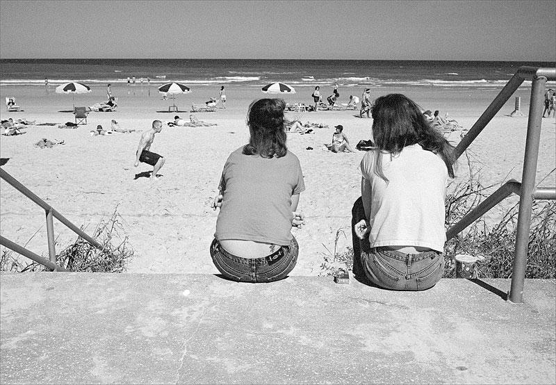 two-girls-on-steps-looking- 